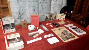 Table with WW1 artifacts and map